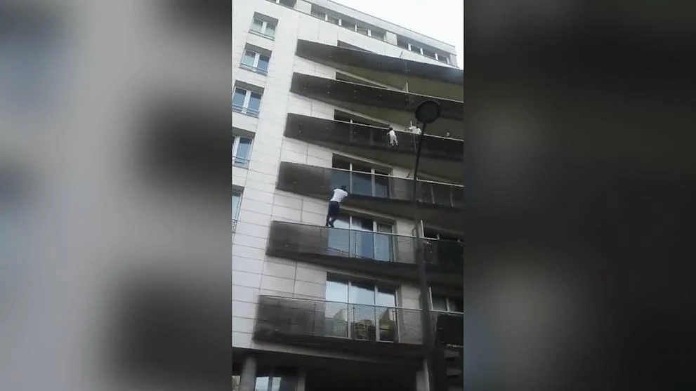 Father of boy saved by Paris ‘Spiderman’ convicted of negligence