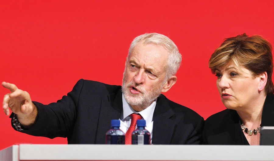 Opposition Labour party leader Jeremy Corbyn, left, and Shadow Foreign Secretary Emily Thornberry during the third day of the Labour party conference in Liverpool Tuesday. (AFP)