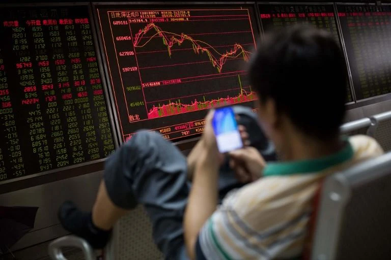 If all the changes are made, Chinese yuan-dominated shares would make up 3.36 percent of MSCI’s Emerging Markets index. (AFP)