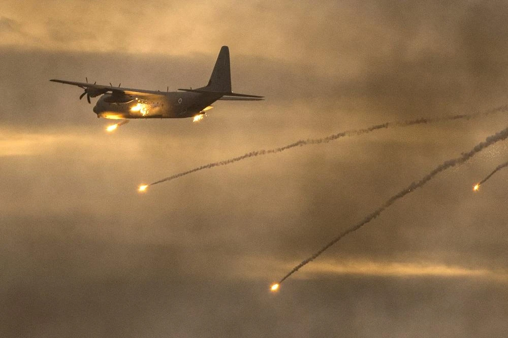 An Israeli C-130 Hercules plane launches anti-missile flares. (File/ AFP)