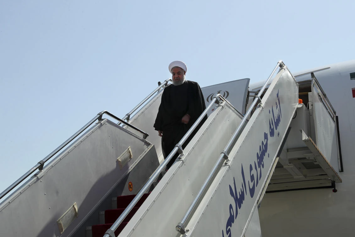 Iranian President Hassan Rouhani steps off his plane in Tehran on his arrival from New York after attending the UN General Assembly. (AP)