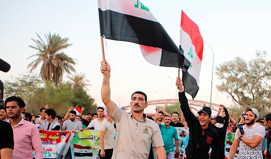 Iraqis demanded better public services and jobs in a demonstration in Basra on Friday. (AP)