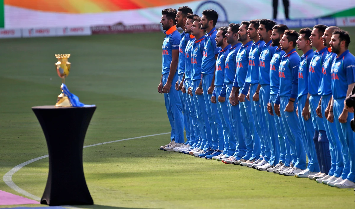 Members of the Indian team stand for their national anthem before the start of the final one-day international cricket match of Asia Cup between India and Bangladesh, in Dubai, United Arab Emirates, Friday, Sept. 28, 2018. (AP)