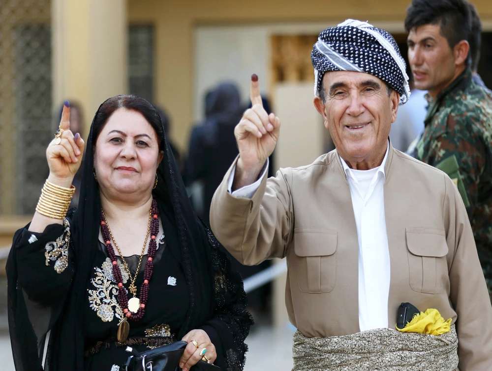 Kurds vote for regional Parliament as Barzani draws battle lines in fight for Iraq presidency