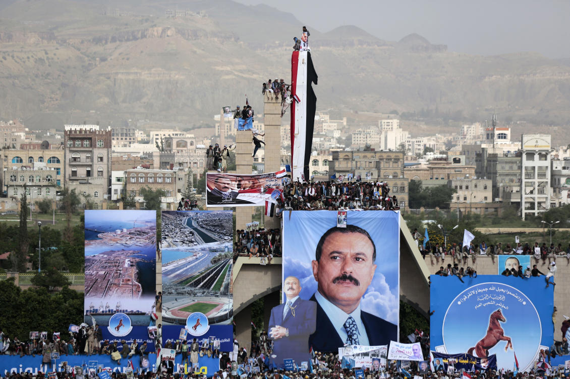Supporters of former Yemeni President Ali Abdullah Saleh attend a ceremony marking the 35th anniversary of the Popular Conference Party in Sanaa. Saleh, whom the Houthis had fought for a decade, became their tactical ally after the 2011 protests. (AP file)