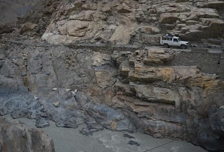 The precarious roads of Pakistan’s mountainous north are lifelines for its scattered and remote population. (AFP)