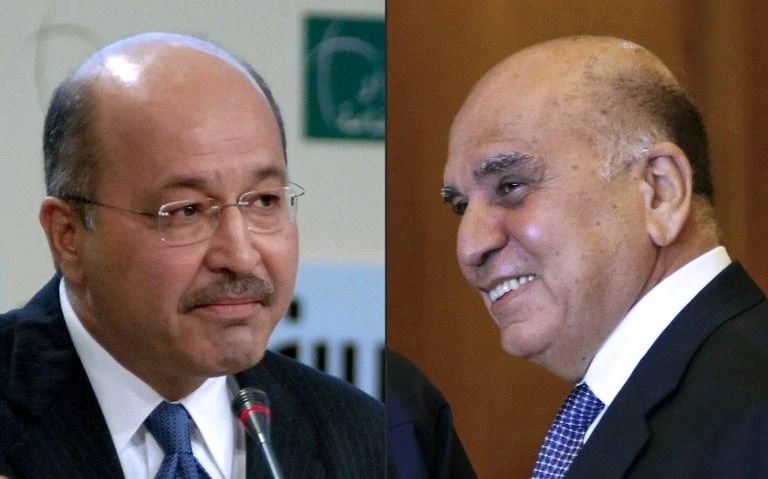 Patriotic Union of Kurdistan’s Barham Saleh, left, and Kurdistan’s Democratic Party Fuad Hussein are touring Iraq’s south to lobby support. (AFP)