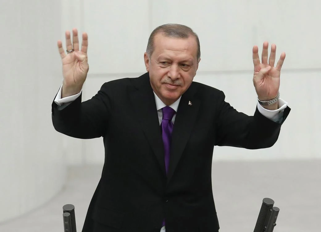The President of Turkey, Recep Tayyip Erdogan greets Turkish members of the parliament during the opening of the second legislative year of the 27th Term of Grand National Assembly of Turkey (TBMM) in Ankara on October 1, 2018. (AFP)