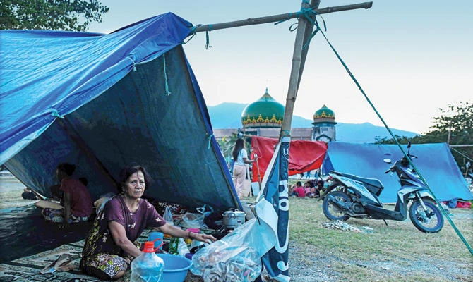 Half-wooden house undamaged in Indonesia’s powerful quakes