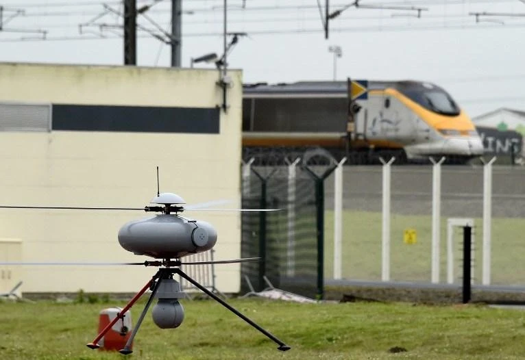 A surveillance drone takes off to monitor the Channel Tunnel in Coquelles, northern France to monitor potential intrusions. (AFP)