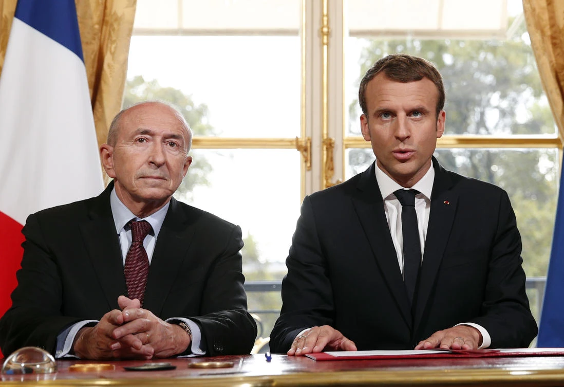 In this Monday, Oct. 30, 2017 file photo French President Emmnauel Macron, right, flanked by French Interior Minister Gerard Collomb, addresses the media after signing a counterterrorism law, at the Elysee Palace, in Paris, France. (AP)
