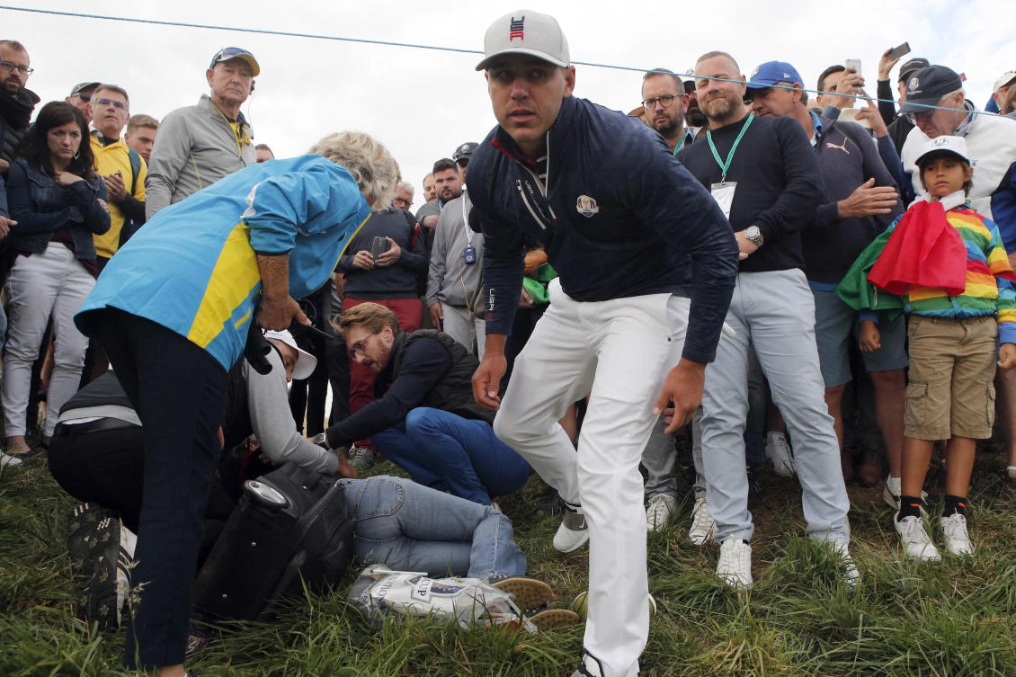 The American was visibly shaken after the incident at Le Golf National, near Paris. (AFP)