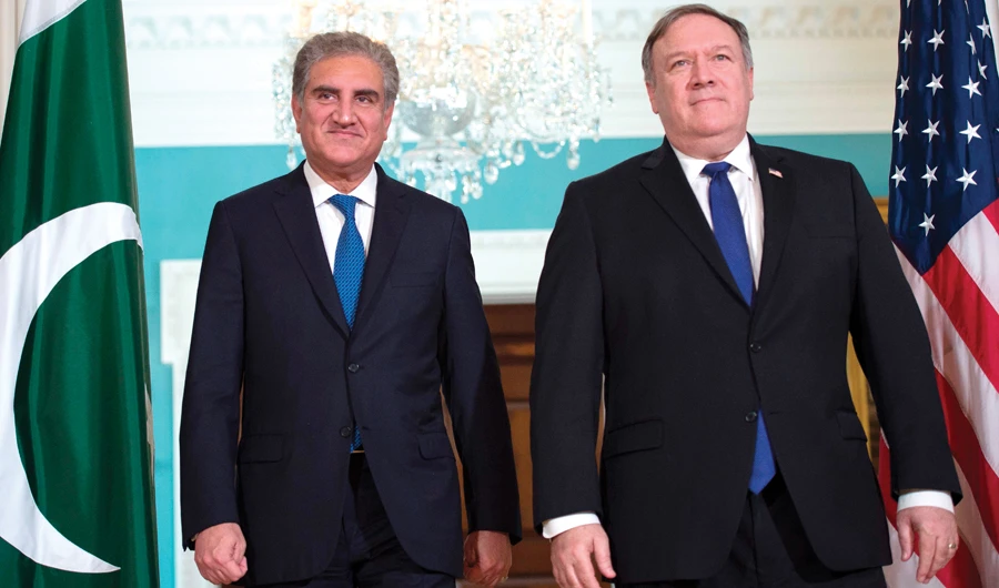 US Secretary of State Mike Pompeo, right, with Pakistani Foreign Minister Shah Mahmood Qureshi at the US State Department in Washington, D.C. on Tuesday. (AFP)