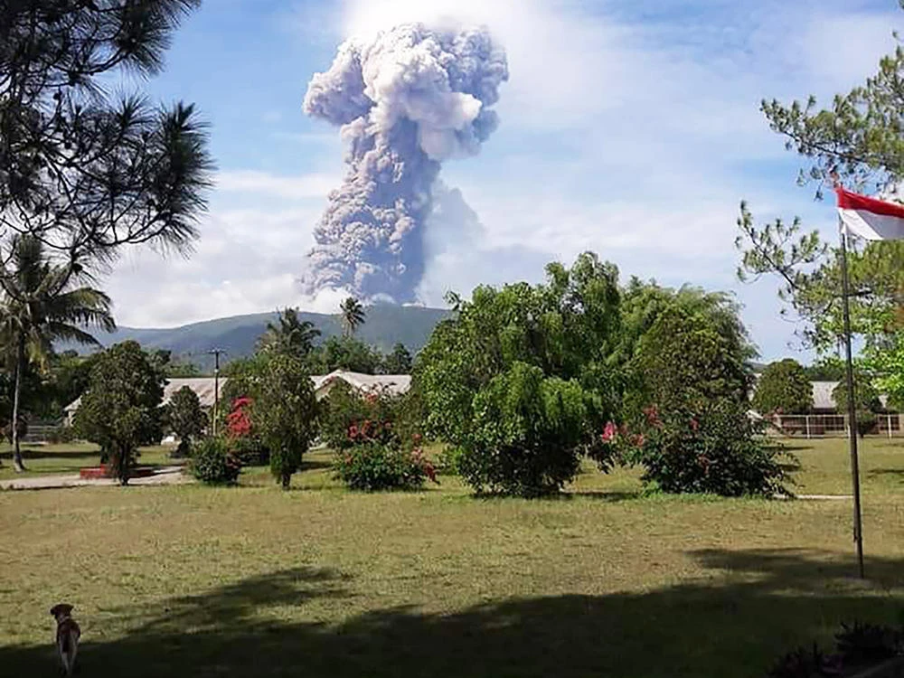 Volcano erupts on same Indonesian island as earlier quake