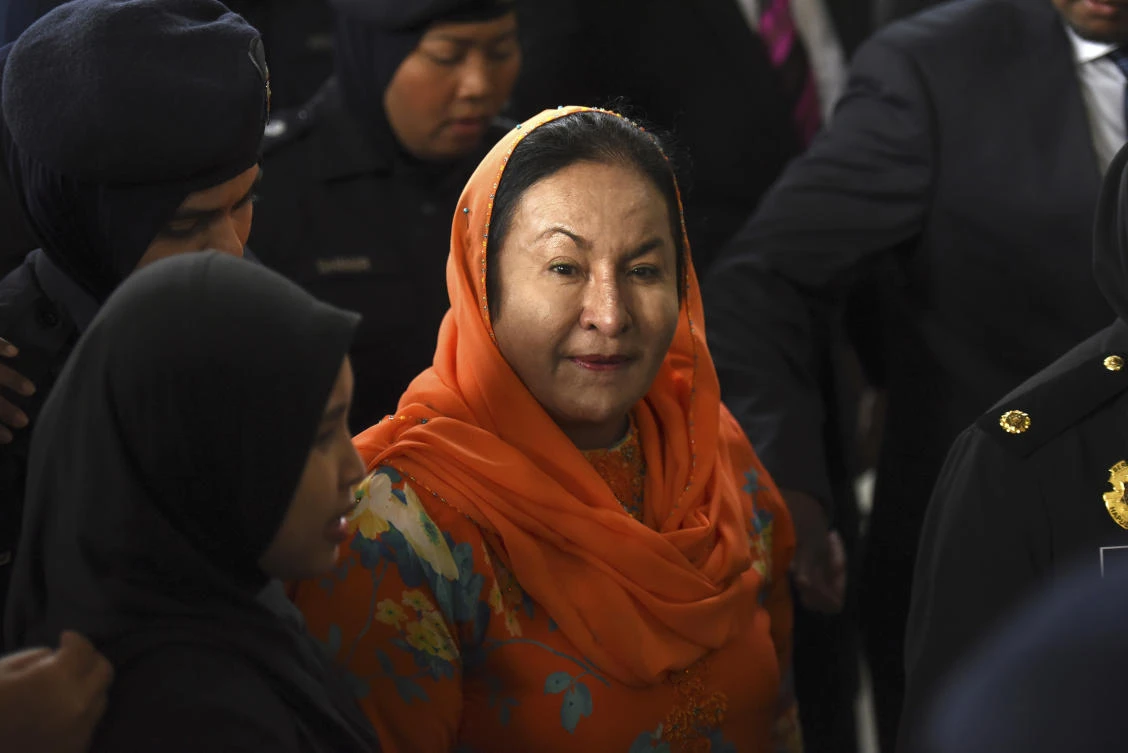 Wife of ex-Malaysian leader charged with money laundering