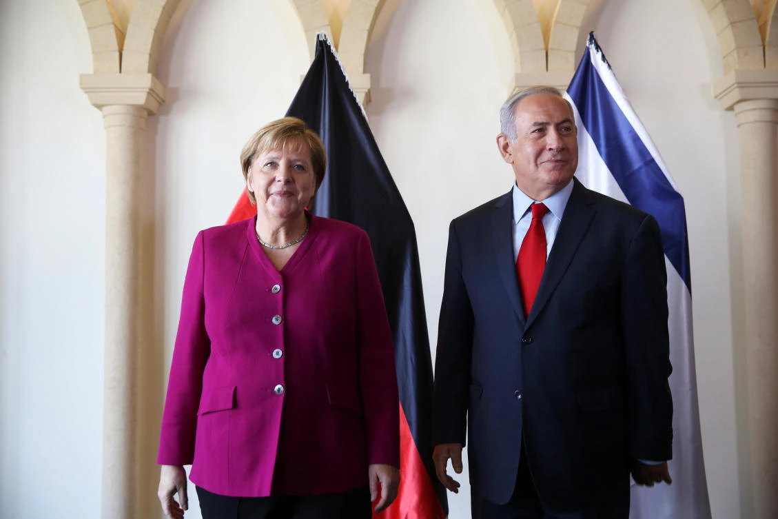 Israeli Prime Minister Benjamin Netanyahu and German Chancellor Angela Merkel pose for photographers between meetings in Jerusalem October 4, 2018. (Reuters)