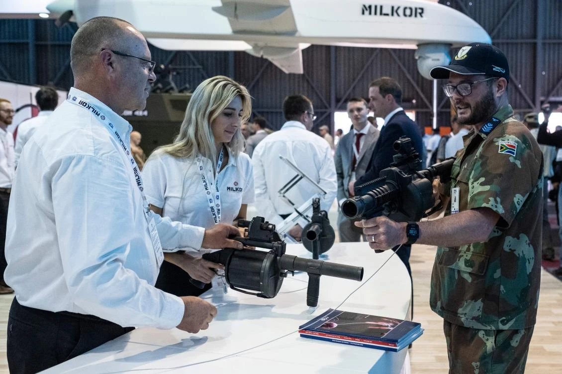 A member of the South African Defence Force holds a MK1S grenade launcher manufactured by Milkor, a South African manufacturer, during the Africa Aerospace and Defence Expo on September 20, 2018, at the Waterkloof Air Force base, on the outskirts of Pretoria. (AFP)