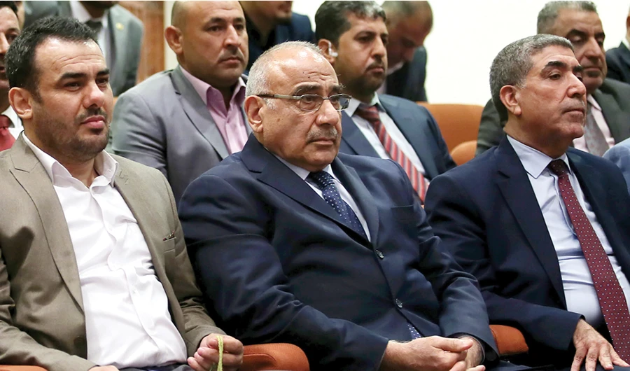Adel Abdul-Mahdi, center, attends a recent parliamentary session. (AFP)