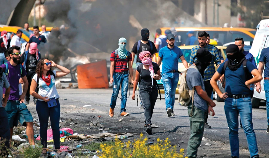 Protesters clash with Israeli forces in Ramallah during a recent demonstration against Israeli atrocities in occupied territories. (AFP file photo)
