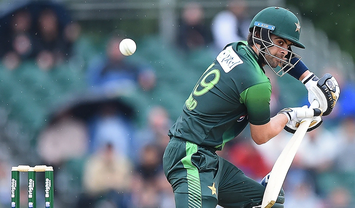 In this file photo, Pakistan’s Ahmed Shehzad plays a shot during the second Twenty20 International cricket match between Scotland and Pakistan at the Grange Cricket Club in Edinburgh, Scotland, on June 13, 2018. (AFP)