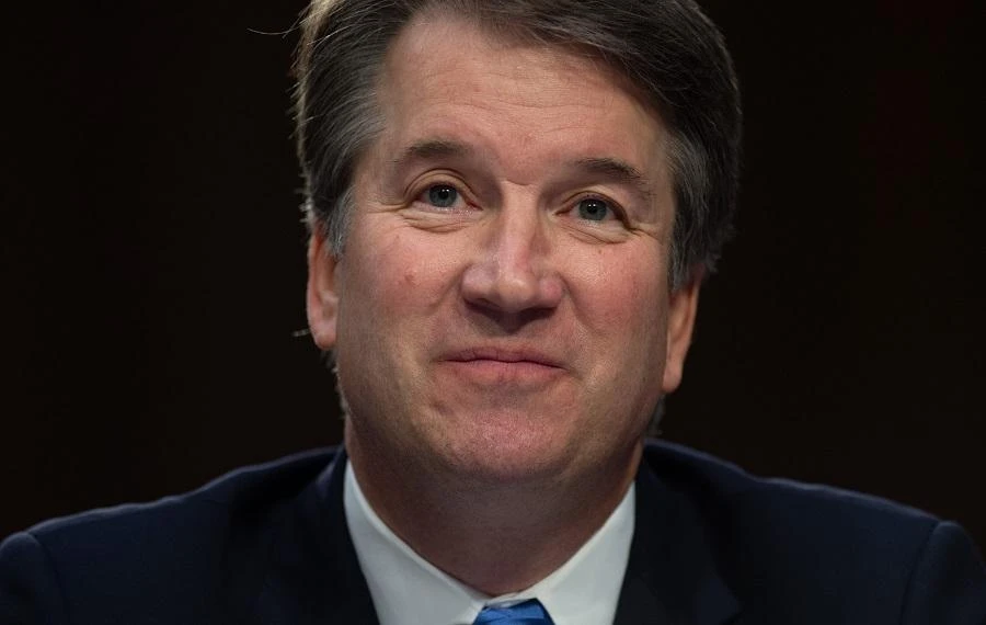 Kavanaugh sworn in as protesters chant outside Supreme Court