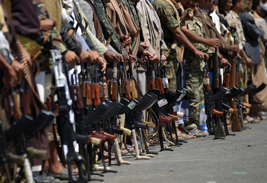 Houthis attacked and detained dozens of young people protesting against plunging living standards and rising prices. (File/AFP)