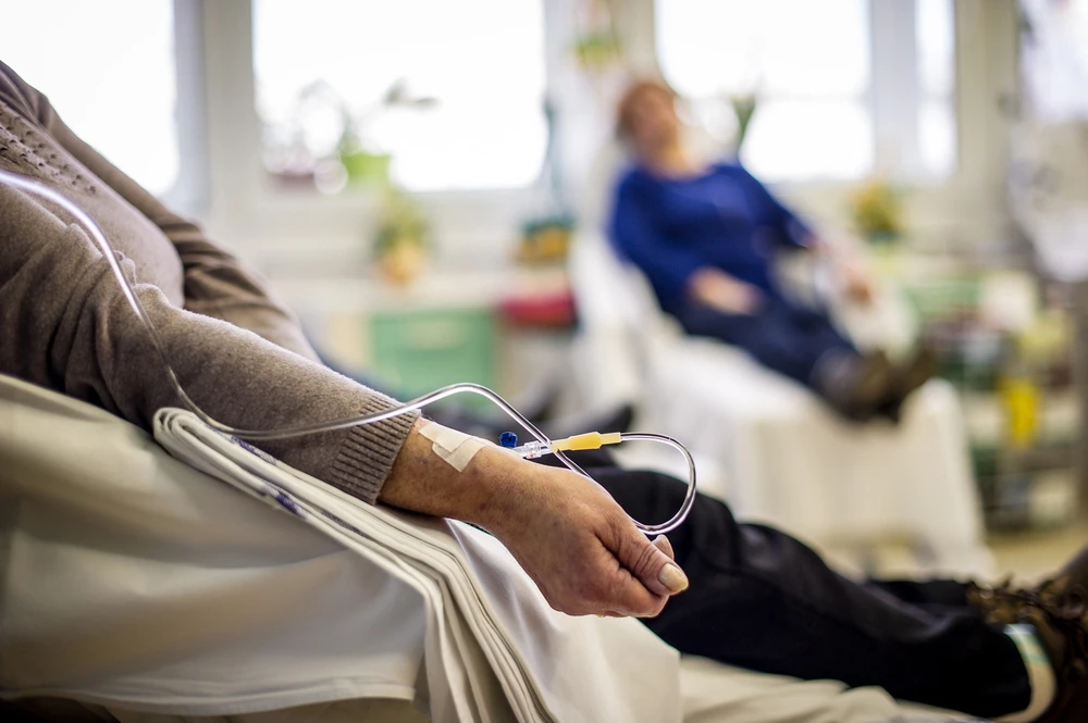 Cancer patients receiving chemotherapy treatment in a hospital. (Shutterstock image)