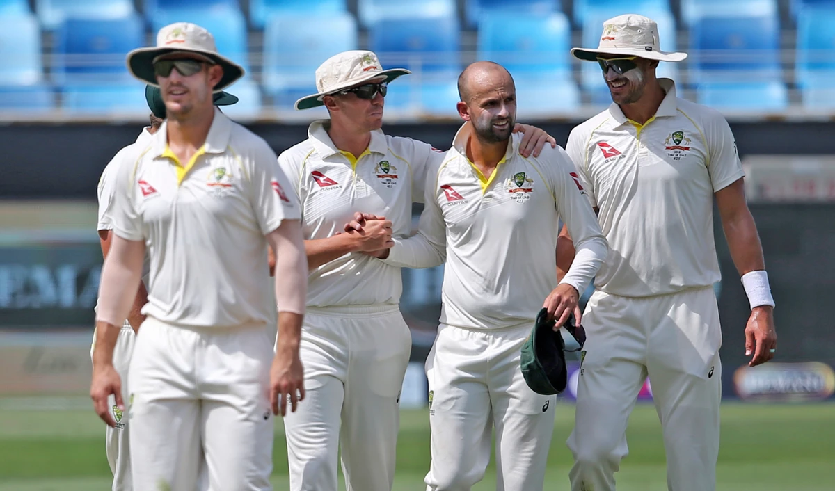 Australia’s Nathan Lyon, 2nd right, celebrates the dismissal of Pakistan’s Asad Shafiq during their test match in Dubai, United Arab Emirates, Wednesday, Oct. 10, 2018. (AP)