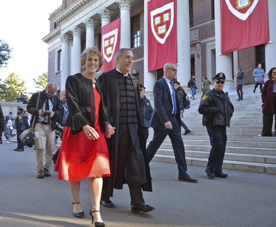 Lawrence Bacow, right, and his wife Adele Fleet Bacow leave Harvard Yard after his inauguration as the 29th President of Harvard University, Friday, Oct. 5, 2018 in Cambridge, Mass. (AP)