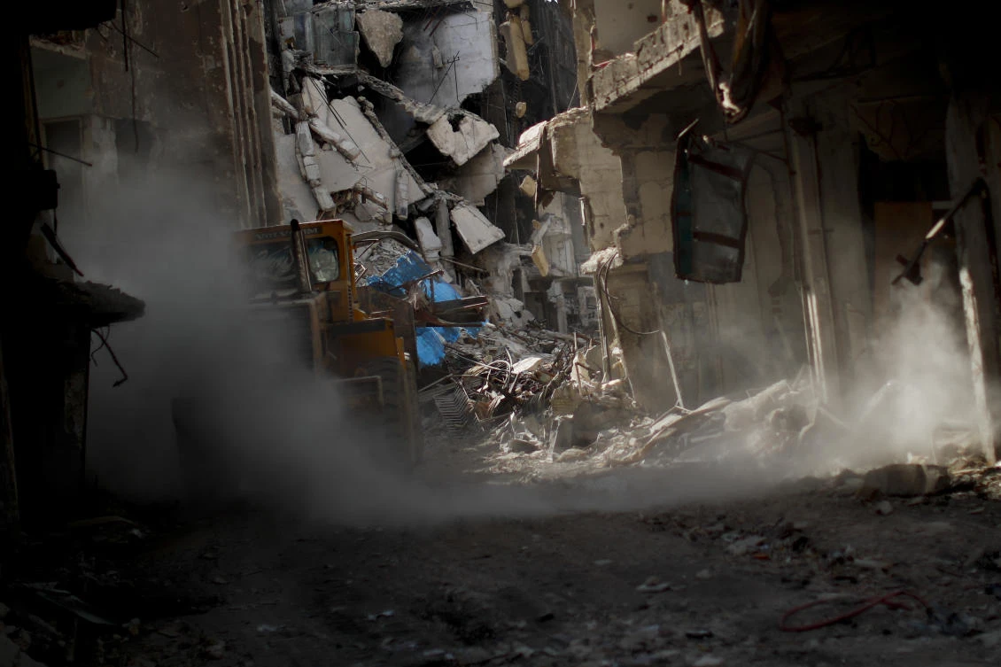 In Syria’s Yarmouk, a pigeon keeper and his dog held out through years of war