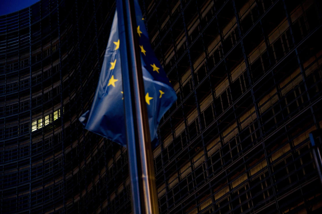 A European Union flag flies outside the European Commission headquarters in Brussels, Sunday, Oct. 14, 2018. (AP)