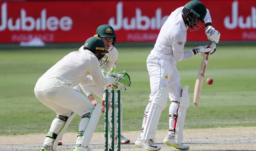 Pakistan cricketer Imam Ul Haq (R) bats on day one of the 1st test cricket match between Australia and Pakistan at the Dubai International Cricket Stadium in Dubai on Oct. 7, 2018. (AFP)
