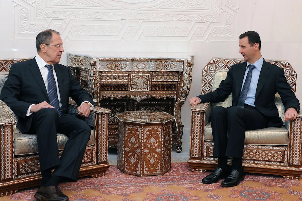 Syria's President Bashar al-Assad (R) meeting with Russian Foreign Minister Sergei Lavrov at the presidential palace in Damascus. (File photo / AFP / Ho / SANA)