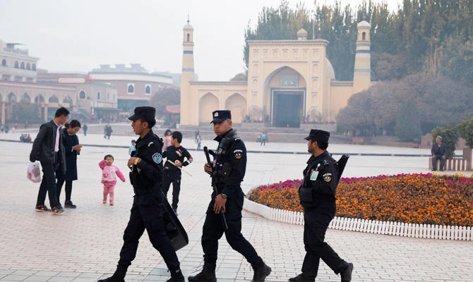 China says interning Muslims brings them into ‘modern’ world
