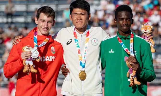 The podium for the Athletics Mens 200m: Haruto Deguchi JPN (centre, Gold Medalist), Daniel Huller HUN (left, Silver Medalist) and Mohammed Duhaim M Almuawi KSA (right, Bronze Medalist) at the Athletics Field, Youth Olympic Park. The Youth Olympic Games, Buenos Aires, Argentina, Tuesday 16th October 2018. Photo: Ivo Gonzalez for OIS/IOC. (Handout image supplied by OIS/IOC)