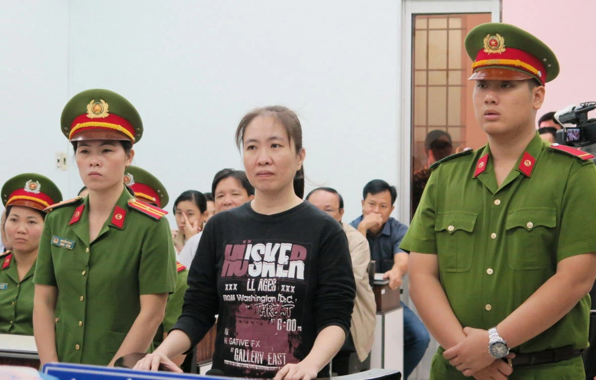 Vietnamese blogger Nguyen Ngoc Nhu Quynh, center, known by her pen name Mother Mushroom, attends her appeal trial at a local people’s court on November 30, 2017 in the central coastal city of Nha Trang. (AFP)