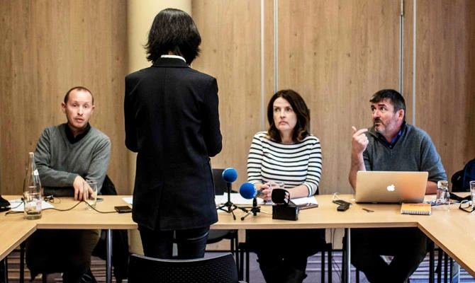 Grace, the wife of the missing Interpol president Meng Hongwey, talks to journalists on October 7, 2018 in Lyon during a press conference during which she did not want her face to be shown, a day after Interpol demanded an official "clarification" from China on the whereabouts of its missing police chief, after reports said he was detained for questioning on arrival in his homeland. (AFP)