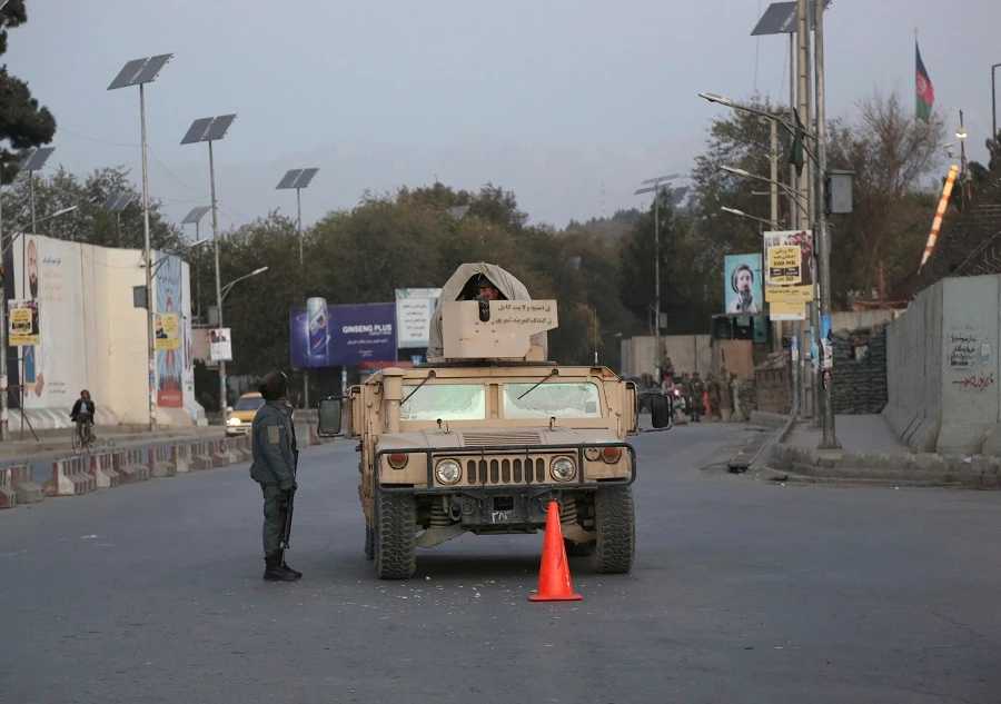 Afghan security personnel stand guard on the day of the parliamentary election in Kabul, Afghanistan, Saturday, Oct. 20, 2018. (AP/Rahmat Gul)