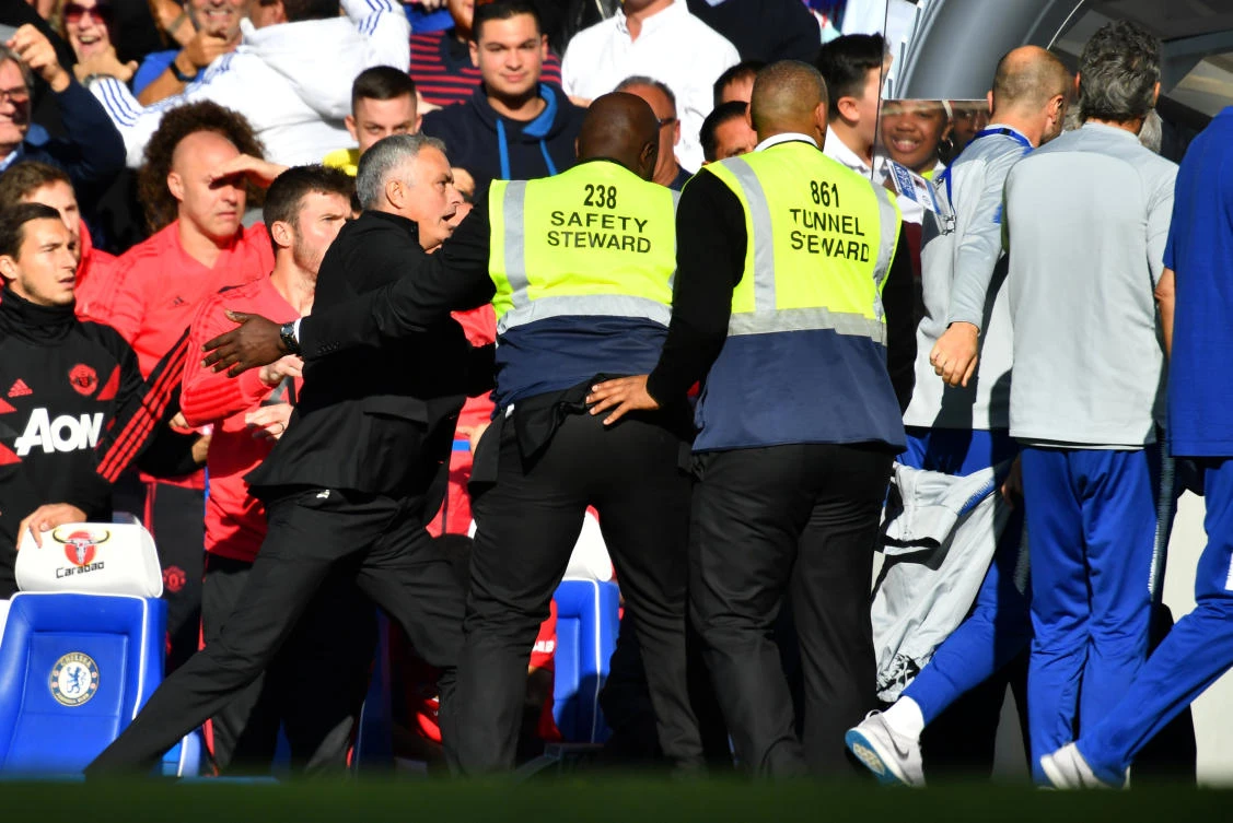 Manchester United manager Jose Mourinho reacts to Chelsea assistant coach Marco Ianni after Chelsea's second goal at Stamford Bridge. (Reuters)
