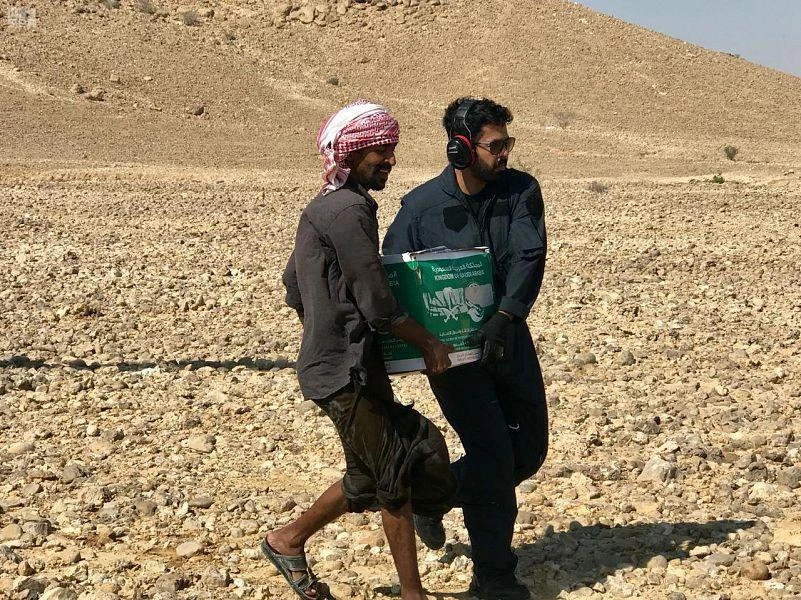 Saudi Security Aviation Command evacuates family trapped due to storm