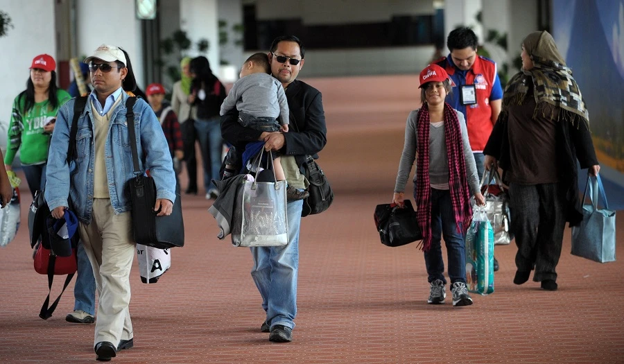 Over 10 million Overseas Filipino Workers are planning to go back to the Philippines upon retirement. (File/AFP)