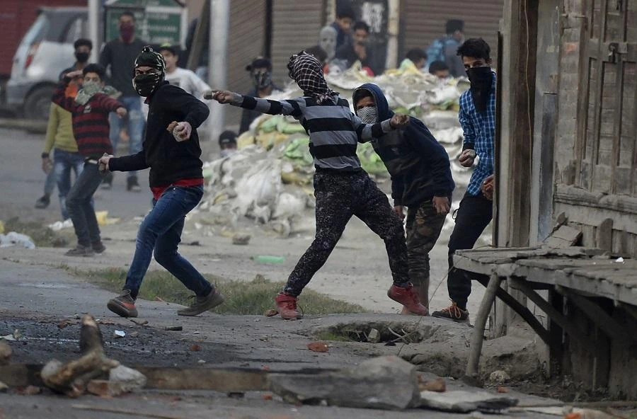 Kashmiri protestors throw stones towards Indian government forces during clashes in downtown Srinagar on October 19, 2018. (File/AFP)