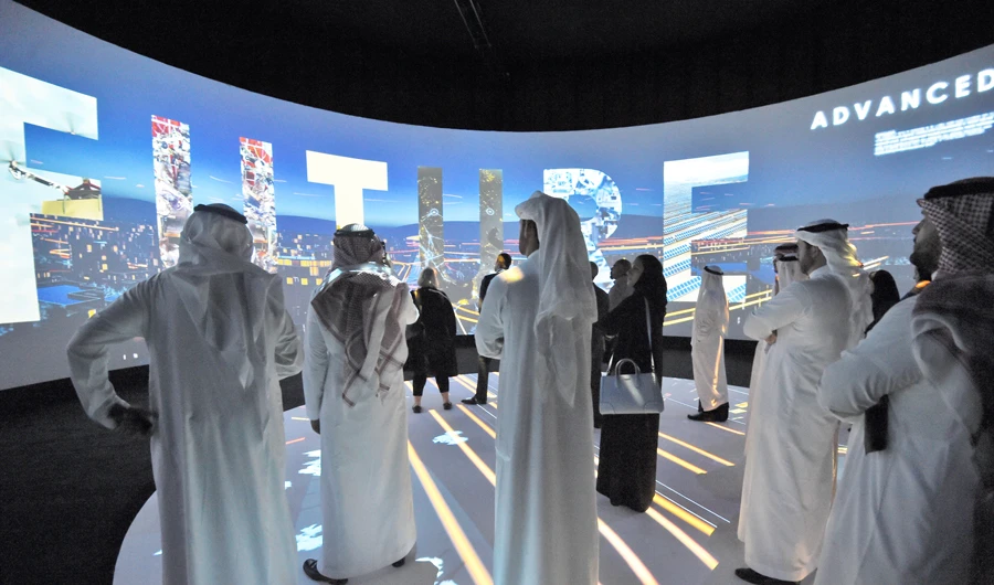 Participants watch a movie highlighting the Red Sea project at last year’s Future Investment Initiatives conference in Riyadh. (AFP)
