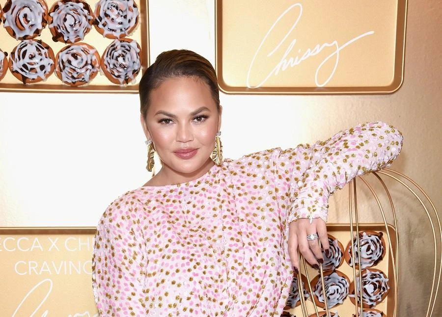 Chrissy Teigen sports a look by Madiyah Al-Sharqi