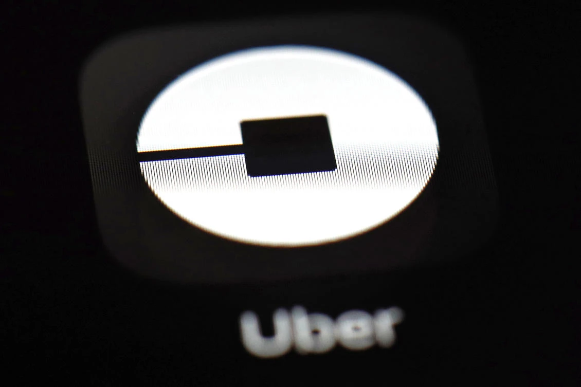 Uber may put forth an initial public offering early next year that values the ride-hailing business at as much as $120 billion, according to a media report. (AP)