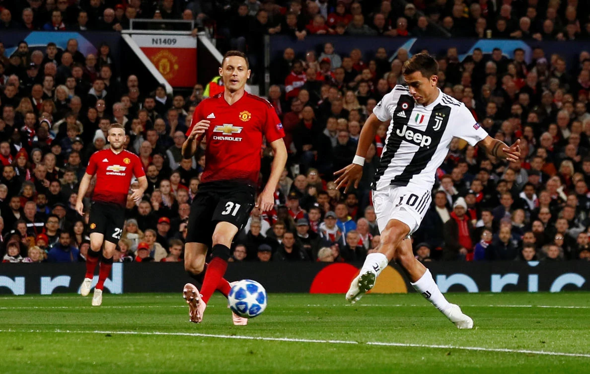 Paulo Dybala scores Juventus’ winner as Manchester United’s Nemanja Matic looks on. (Reuters)
