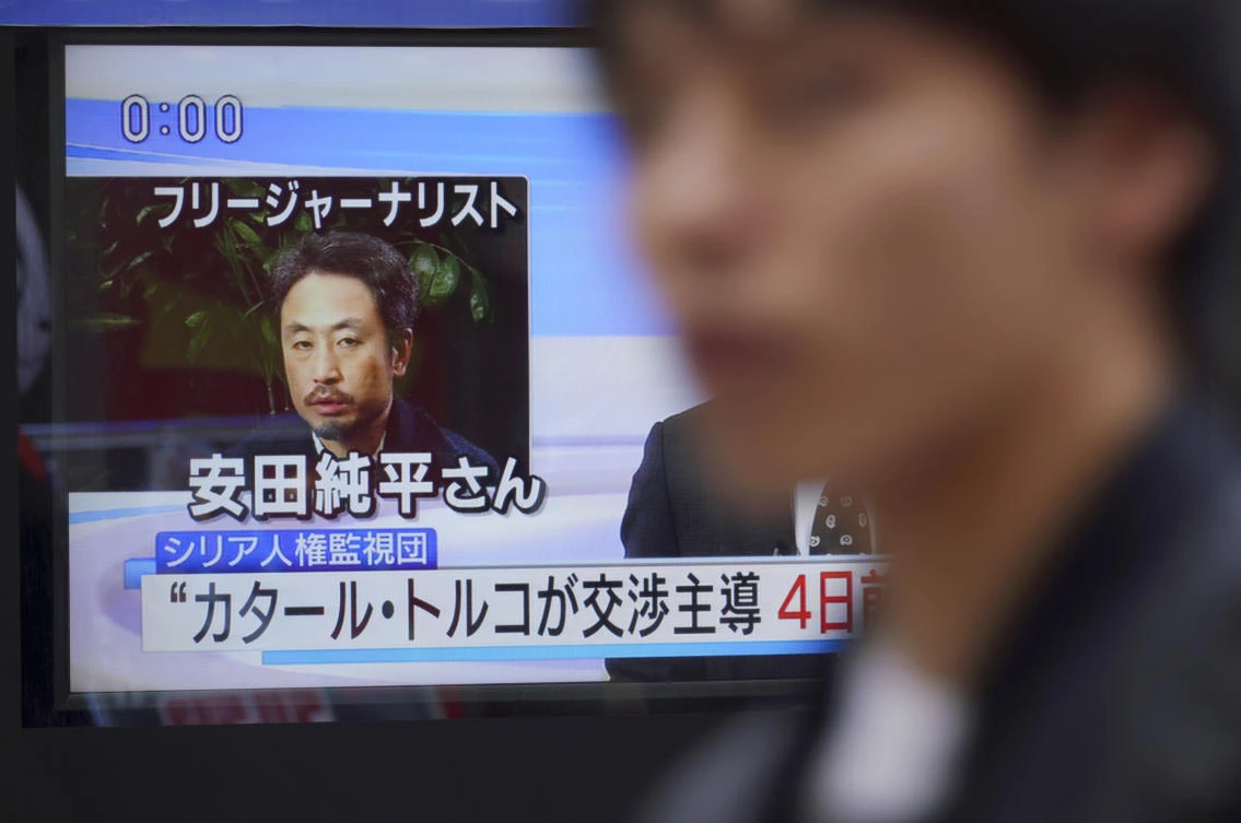A man believed to be Yasuda who disappeared three years ago in Syria has been released and is now in Turkey, a Japanese official said. (AP/Eugene Hoshiko)