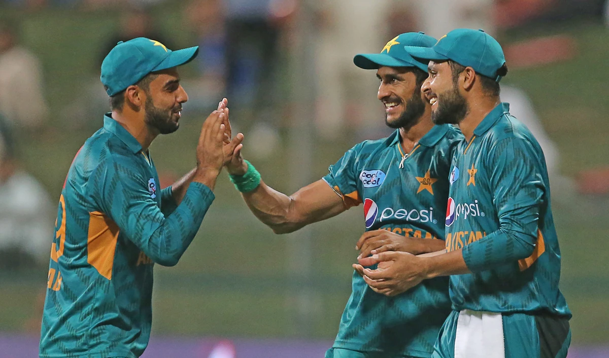 Pakistan cricketer Hasan Ali, center, celebrates with teammates after dismissing Australian cricketer Adam Zampa during the first Twenty20 cricket match between Australia and Pakistan at Sheikh Zayed Stadium in Abu Dhabi on Oct. 24, 2018. (AFP)