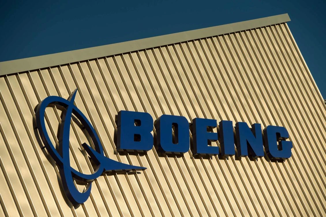 Boeing signage is seen on the outside of the Boeing Sheffield factory, the aerospace company's first manufacturing facility in Europe where the opening of the site was celebrated with great pomp in the presence of senior executives of the aircraft manufacturer and British politicians, ahead of Brexit. (AFP)