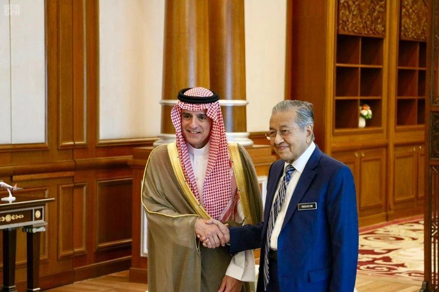 Saudi Arabia’s Foreign Minister Adel Al-Jubeir meets Malaysian Prime Minister Mahathir Mohamad in Kuala Lumpur on Friday. (SPA)